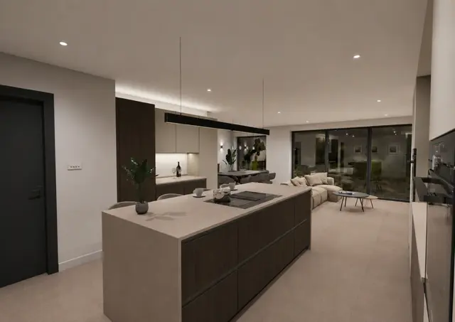 Kitchen island and living area at evening